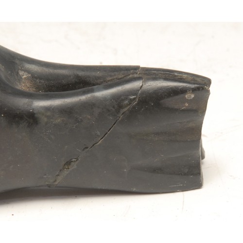 3751 - An Inuit green stone carving, of a seal, inscribed number 1678, 21cm long