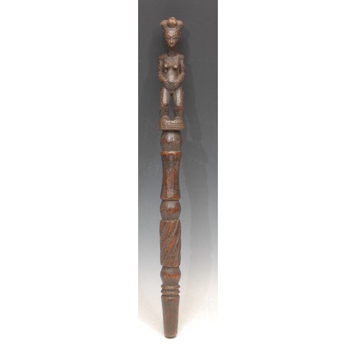 3783 - Tribal Art - a Yoruba staff or house marker, carved with a female figure, 47.5cm long