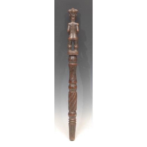 3783 - Tribal Art - a Yoruba staff or house marker, carved with a female figure, 47.5cm long