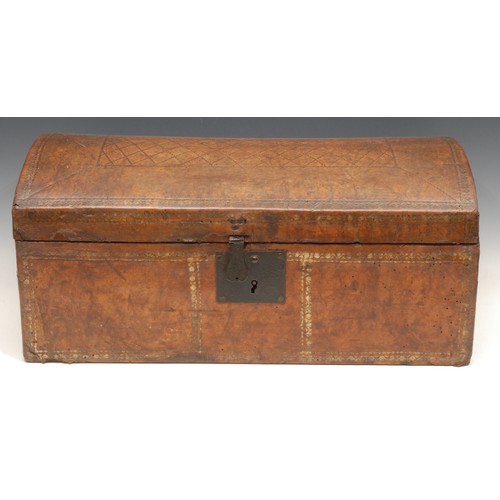 3245 - An 18th century tooled leather table top document trunk, iron lockplate and hasp, carrying handles t... 