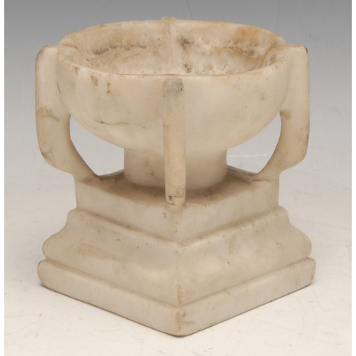 3592 - A 19th century Italian marble font, of small proportions, in the Grand Tour manner, flanked by four ... 