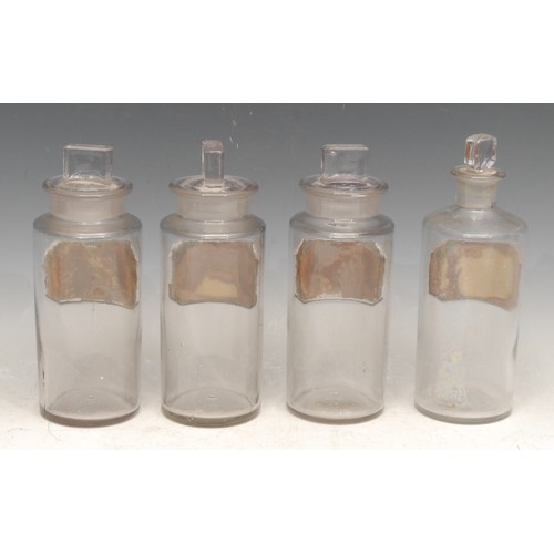 3108 - A set of four late 19th/early 20th century apothecary jars, gilt labels, the largest 18cm high