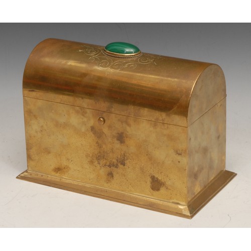 3252 - An Art Nouveau period brass stationery box, the domed cover mounted with a malachite stone and chase... 