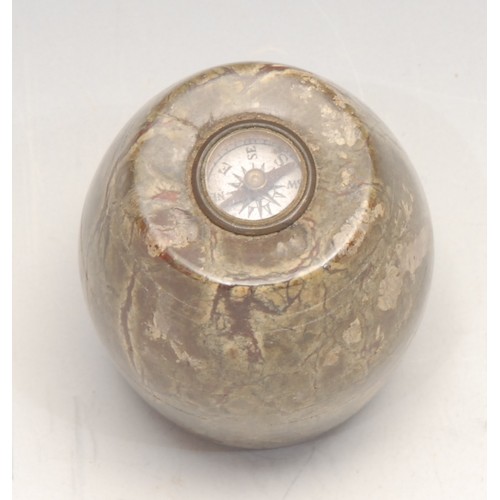 3279 - An early 20th century Cornish serpentine barrel shaped novelty desk weight, set with a compass, 4.5c... 