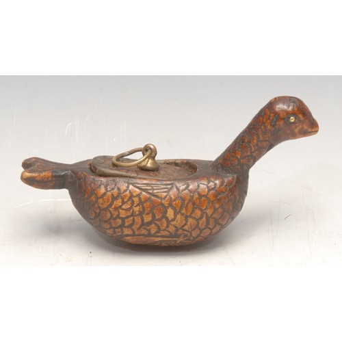 3565 - A 19th century folk art treen snuff box, naively carved as a water fowl, 11.5cm long