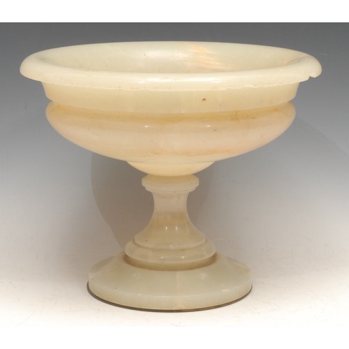 3572 - A 19th century French onyx compressed campagna shaped pedestal urn, 25cm diameter