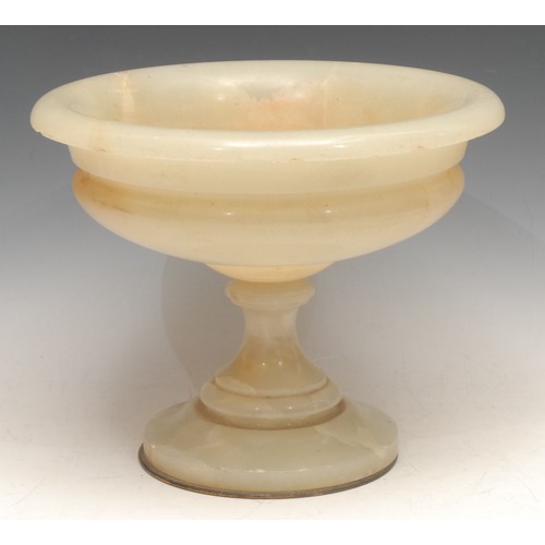 3572 - A 19th century French onyx compressed campagna shaped pedestal urn, 25cm diameter