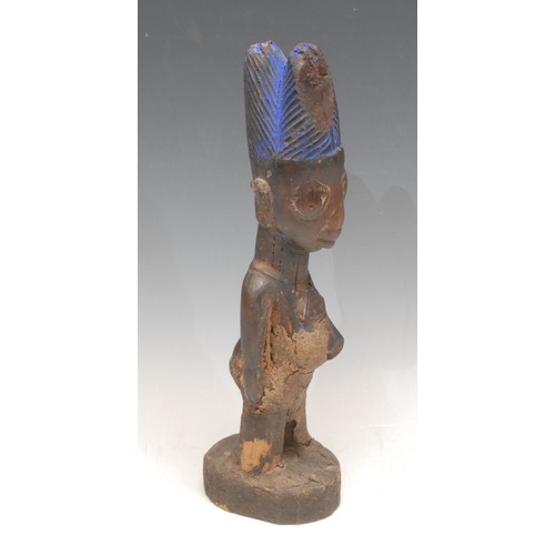 3782 - Tribal Art - a Yoruba Ibeji figure, decorated with blue pigment, 27.5cm high, Nigeria