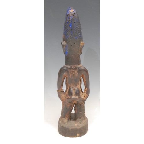 3782 - Tribal Art - a Yoruba Ibeji figure, decorated with blue pigment, 27.5cm high, Nigeria