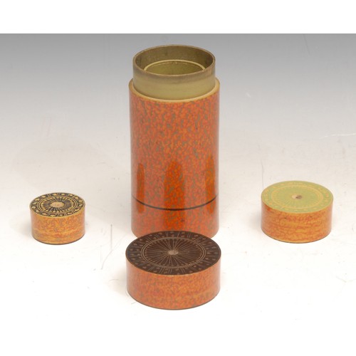 3197 - A set of three Indian cylindrical stacking boxes, the largest 13.5cm high