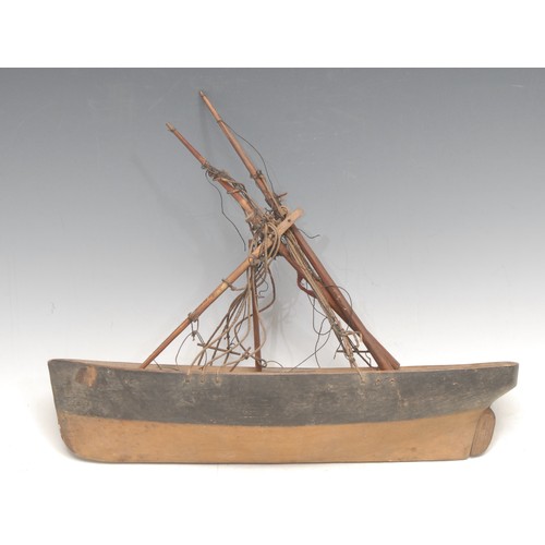 3392 - Folk Art - a softwood model fishing boat, 27cm long