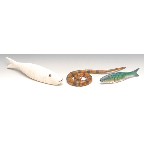 3394 - Folk Art - an articulated model, of a fish, 30cm long; another, similar, naturalistically painted; a... 