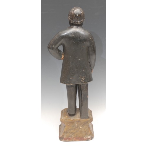 3606 - A 19th century plaster figure, of a statesman, he stands upon a faux marble plinth, 40cm high, impre... 