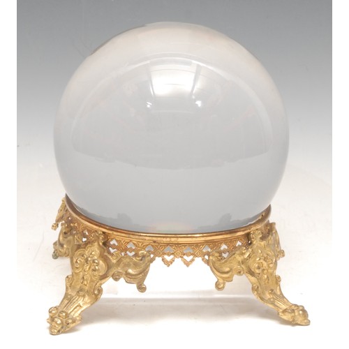 3461 - Mysticism & The Occult - a large crystal ball, gilt metal stand, 19cm high overall