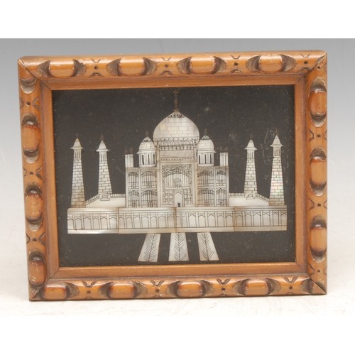 3331 - An Indian pietra dura rectangular panel, inlaid in mother of pearl with a view of the Taj Mahal, 7cm... 