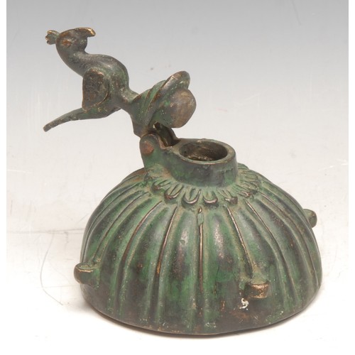 3585 - A 19th century Indian bronze inkwell, peacock finial, 11cm high, possibly late Mughal period