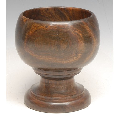 3700 - Treen - a turned lignum vitae goblet, 12cm high