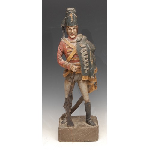 3501 - Treen - a 19th/early 20th century softwood carving of a French soldier, painted in polychrome, 45cm ... 