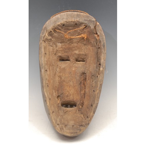 3763 - Tribal Art - a Dan mask, concave features with central ridge, picked out in white and earth pigments... 