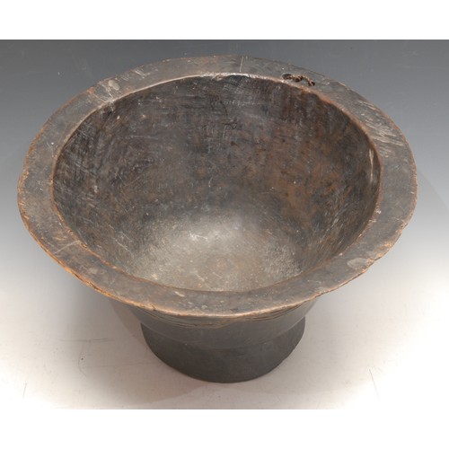 3761 - Tribal Art - a Dan bowl, flared rim above a geometric band of interlaced ellipses, skirted base, 35c... 