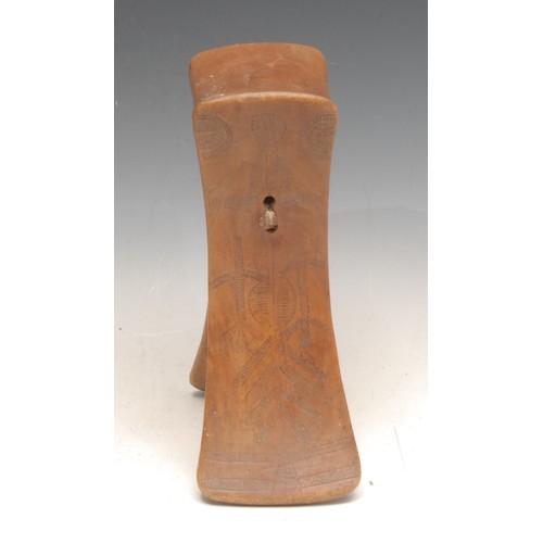 3775 - Tribal Art - a Samburu headrest, of typical three-legged form, central ridge to sides, 21cm wide, No... 