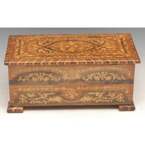 3338 - An Italian marquetry musical vanity case, the inlaid hinged cover revealing a cushioned interior, 11... 