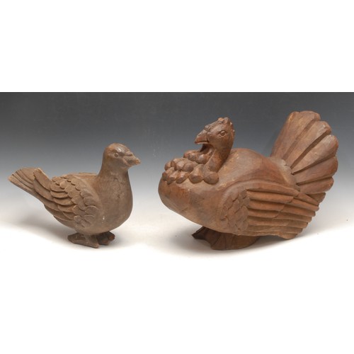 3696 - Treen - a 19th century French provincial carved wooden papier-mâché mould, as a hen, 28cm high; anot... 