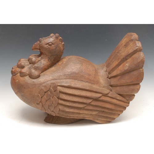 3696 - Treen - a 19th century French provincial carved wooden papier-mâché mould, as a hen, 28cm high; anot... 