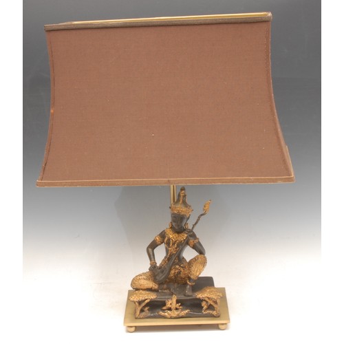 3484 - Thai School, a bronze, of a Buddha playing a veena, later converted to a lamp and mounted on a brass... 