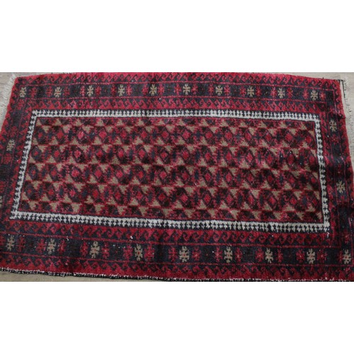 3678 - Rugs & Carpets - a mid 20th century Afghan wool rug, in the Balouch style, 157cm long, 190cm wide