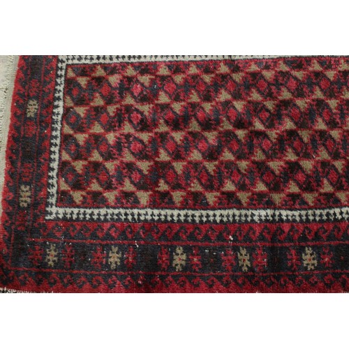 3678 - Rugs & Carpets - a mid 20th century Afghan wool rug, in the Balouch style, 157cm long, 190cm wide