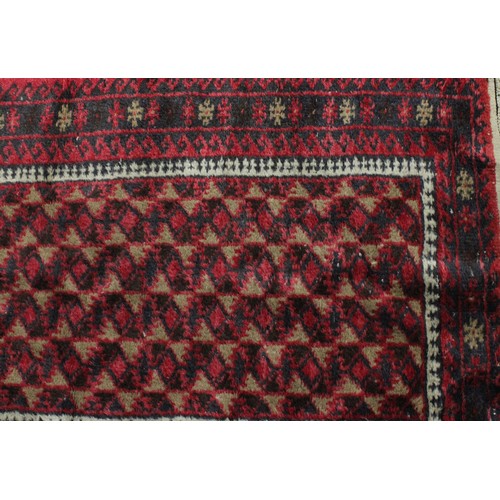 3678 - Rugs & Carpets - a mid 20th century Afghan wool rug, in the Balouch style, 157cm long, 190cm wide