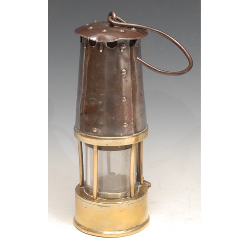 3365 - Colliery Interest - a Protector Lamp & Lighting Co. brass and steel miner’s lamp, Eccles, 24cm high;... 