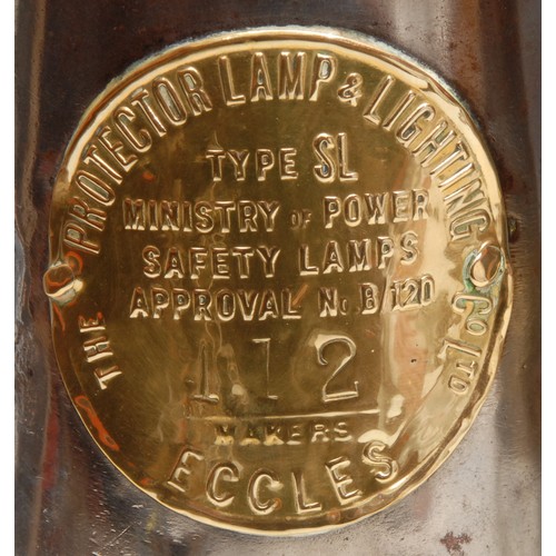 3365 - Colliery Interest - a Protector Lamp & Lighting Co. brass and steel miner’s lamp, Eccles, 24cm high;... 