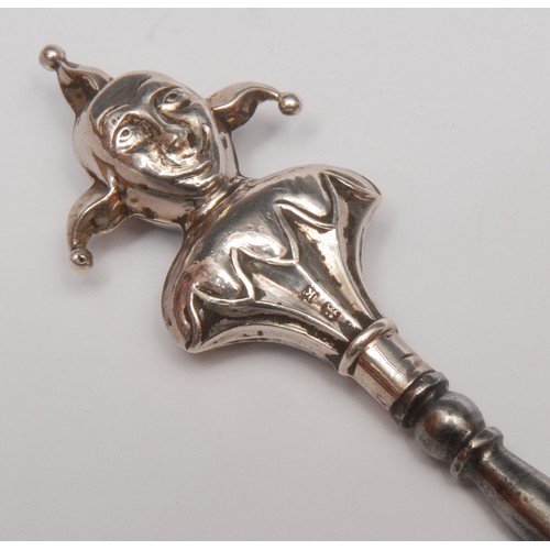 3685 - An Edwardian novelty glove hook, the terminal as Mr Punch, Birmingham 1907; others similar, Jester, ... 