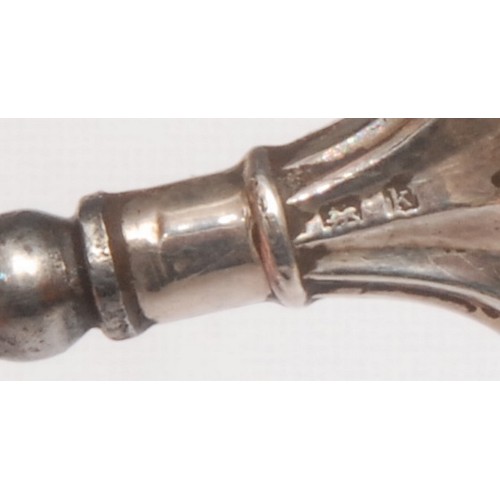 3685 - An Edwardian novelty glove hook, the terminal as Mr Punch, Birmingham 1907; others similar, Jester, ... 