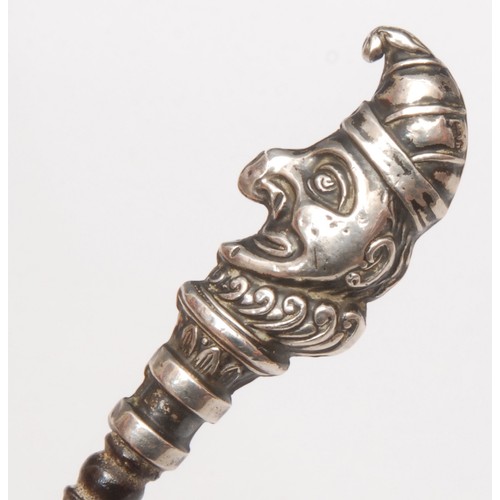 3685 - An Edwardian novelty glove hook, the terminal as Mr Punch, Birmingham 1907; others similar, Jester, ... 