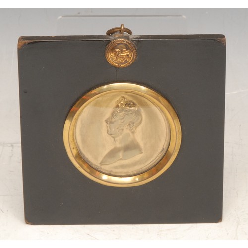 3476 - Royal History - a 19th century gilt metal portrait roundel, King William IV, in profile, bust length... 