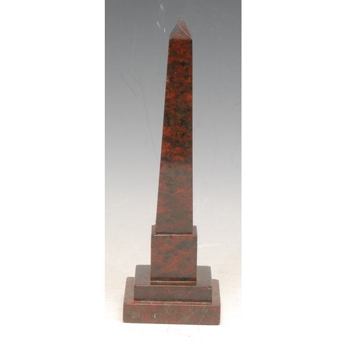 3551 - A 19th century Cornish red serpentine desk model, of an obelisk in the Grand Tour taste, stepped squ... 