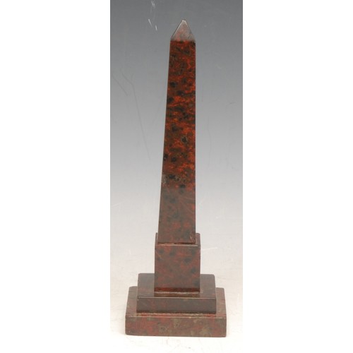 3551 - A 19th century Cornish red serpentine desk model, of an obelisk in the Grand Tour taste, stepped squ... 