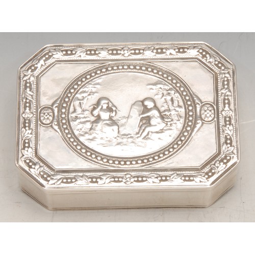 3681 - A Continental silver canted rectangular table snuff box, hinged cover, chased in the neoclassical ta... 