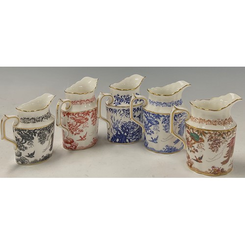 38 - A collection of Royal Crown Derby cream jugs, various shapes, including Mikado, Blue Aves, Red Aves,... 