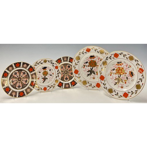 39 - A pair of Royal Crown Derby Imari 1128 pattern tea plates; two Red Aves pattern plates; four 8687 pa... 