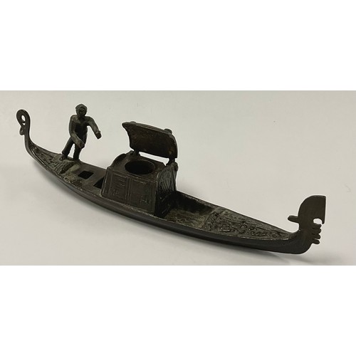 58 - A dark patinated bronze novelty inkwell, as a Venetian gondola