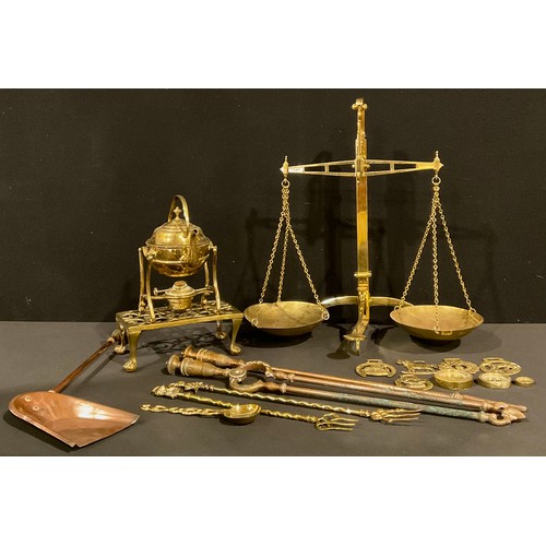 80 - A 19th century copper fireside companion set; a set of brass banker's beam scales, Mattwood, Birming... 