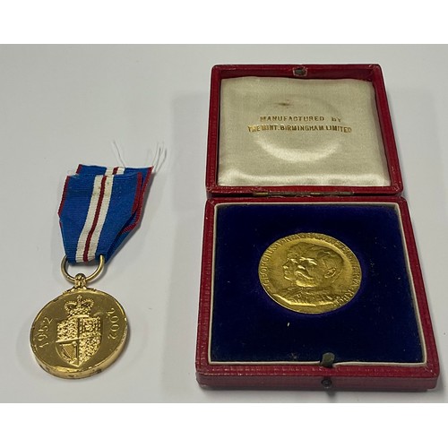 189 - A Queens Golden Jubilee medal 1952 - 2002; a George V medallion to Royal visit to Bristol 28th June ... 