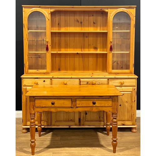 119 - A pine farmhouse kitchen table, drawers to frieze, 73.5cm high, 114.5cm wide, 65.5cm deep; a pine fa... 