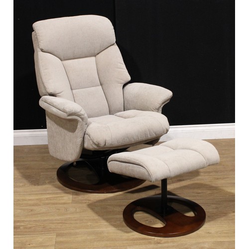 123 - A Global Furniture Alliance swivel lounge chair, 104cm high, 75cm wide, the seat 43cm wide and 49cm ... 