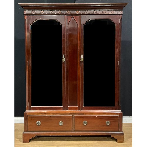 201 - An early 20th century mahogany wardrobe, by or retailed by Henry Barker Ltd, Nottingham, 212.5cm hig... 