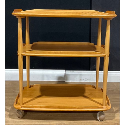 210 - An Ercol beech and elm three tier trolley, 76.5cm high, 71.5cm wide, 46cm deep